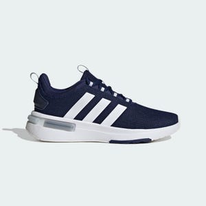 A navy blue athletic shoe with white stripes and a white sole, featuring a pull tab on the heel.