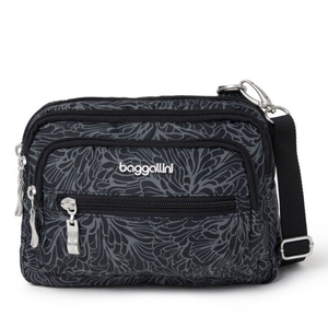 Baggallini Triple Zip Bag in black with a gray leaf pattern; features three zippered pockets, adjustable black strap, and silver hardware.