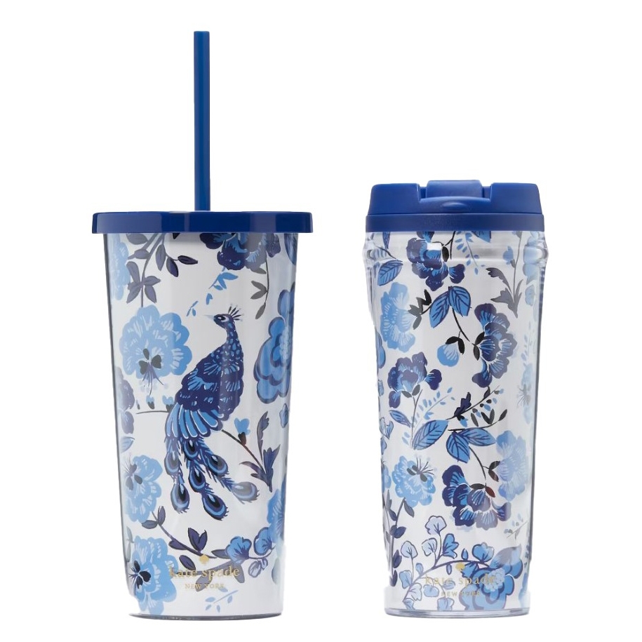 Two Kate Spade drinkware items with blue floral and bird designs; one is a tumbler with a straw lid, and the other is a travel mug with a flip-top lid.