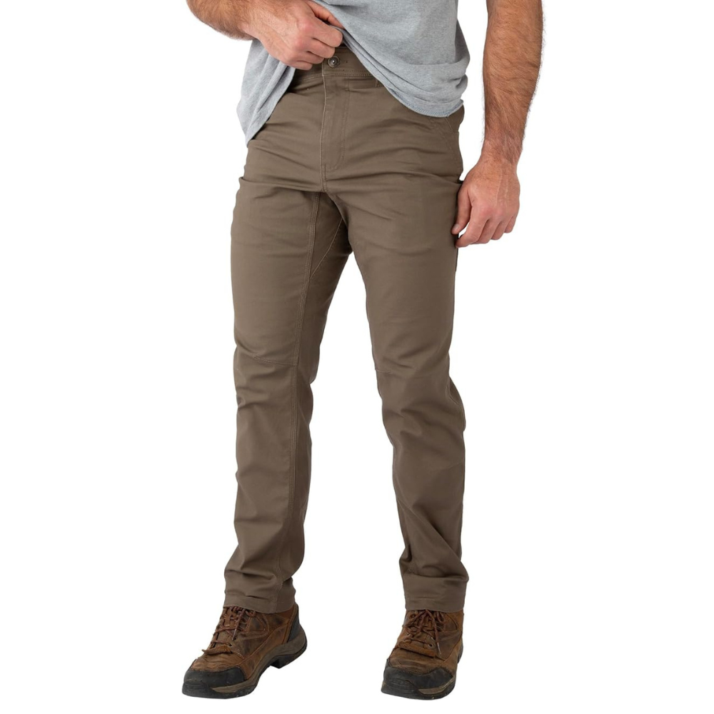A person is wearing brown pants and brown hiking boots, paired with a gray t-shirt.