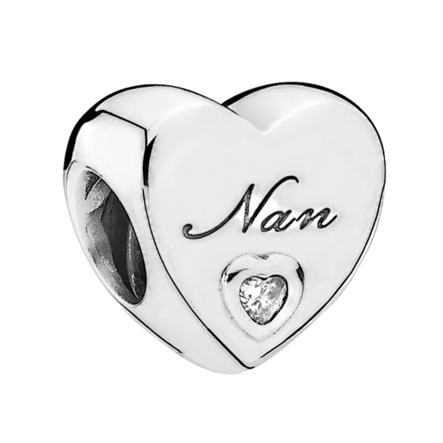 A heart-shaped charm with the word \“Nan\“ engraved, featuring a small heart cutout with a gemstone inside.