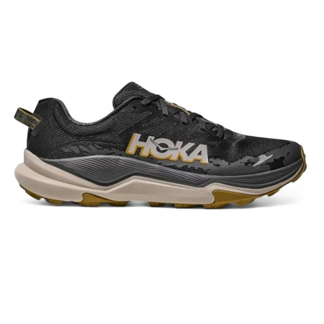 Hoka running shoe with a black upper, gold accents, and a beige and gold midsole.