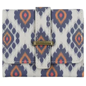 A wallet with a geometric ikat pattern in blue, orange, and white, featuring a flap closure with a brass-colored metal accent.