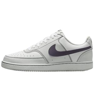 A white low-top sneaker with a black Swoosh logo on the side, featuring white laces and a rubber sole.