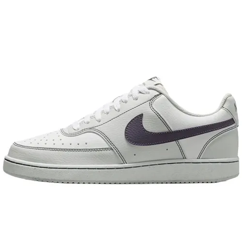 A white low-top sneaker with a black Swoosh logo on the side, featuring white laces and a rubber sole.