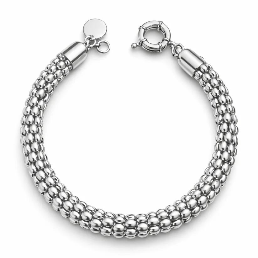 A silver bracelet with a beaded design and a circular clasp closure.
