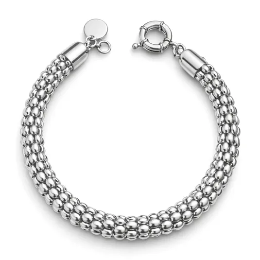 A silver bracelet with a beaded design and a circular clasp closure.