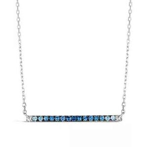 A silver necklace with a horizontal bar pendant featuring a gradient of small blue gemstones from light to dark.