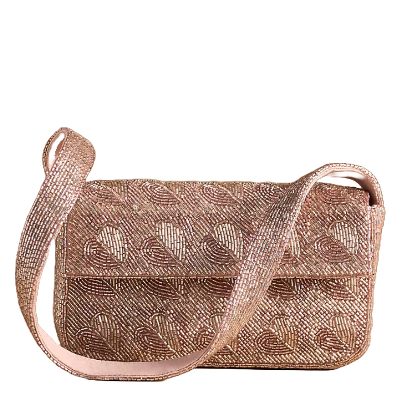 A rose gold shoulder bag with intricate beaded heart patterns and a matching beaded strap, ideal for adding elegance to outfits.