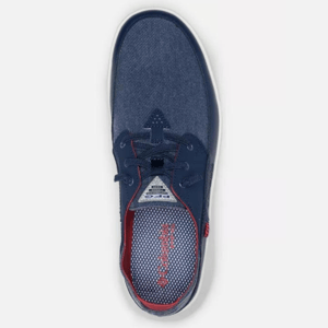 Top view of a denim blue sneaker with red accents and white laces.