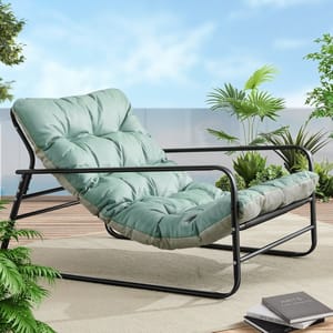A comfortable outdoor lounge chair with a metal frame and cushioned seat, surrounded by potted plants on a wooden deck.