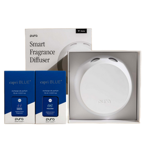 Pura Smart Fragrance Diffuser set includes a white diffuser and two Capri Blue fragrance refills, \“Havana Vanilla\“ and \“Volcano,\“ each 10 ml (0.33 fl oz).