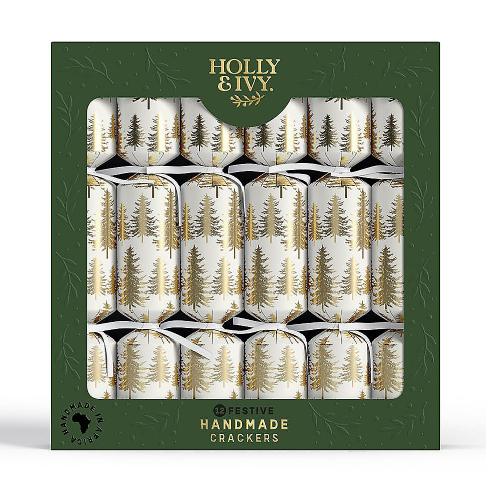 Box of festive handmade crackers by Holly & Ivy, featuring a design with gold trees on a white background.