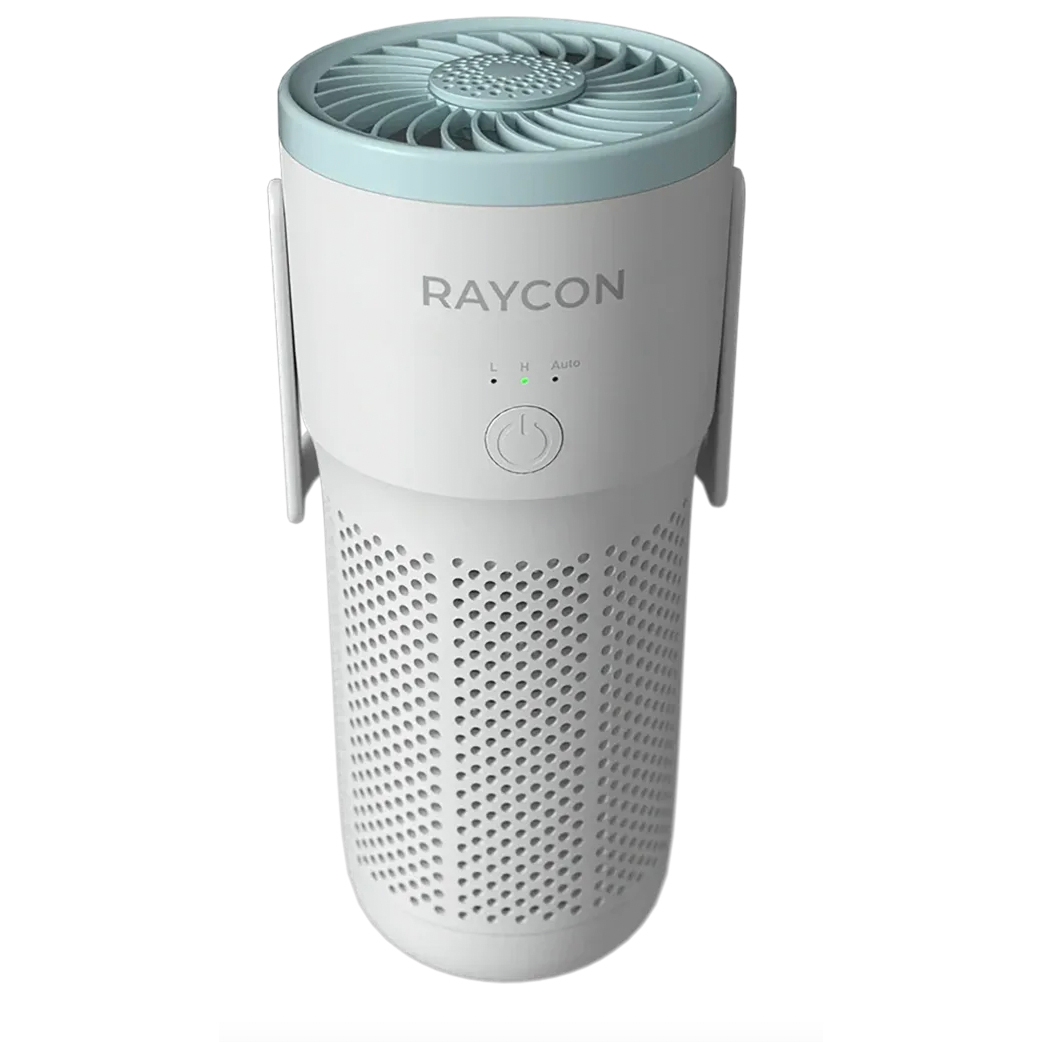 Portable HEPA air purifier with a cylindrical design, features a fan on top, and includes settings for low, high, and auto modes. It's marked with \“RAYCON\“ and has an easy-access power button.