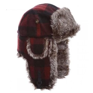 This is a red and black plaid trapper hat with fluffy ear flaps that can be secured under the chin or worn on top of the head.