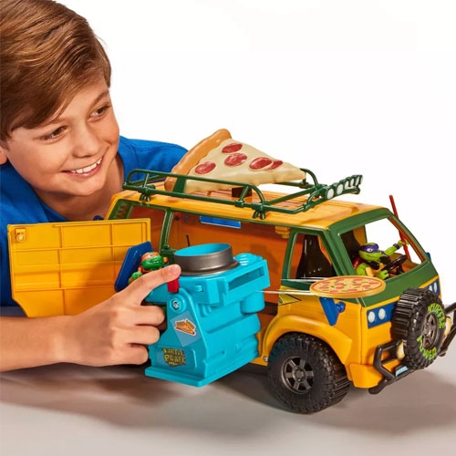 a child shooting plastic pizza from a mutant turtles van toy