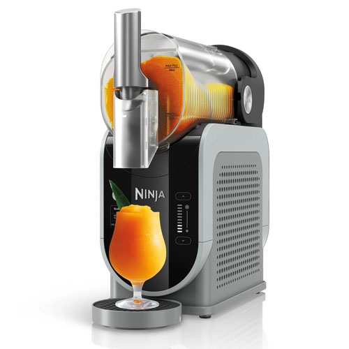 the ninja slushi machine with a frozen orange cocktail