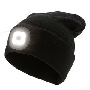 A black beanie with an integrated LED light on the front, designed to provide hands-free illumination for outdoor activities or low-light conditions.