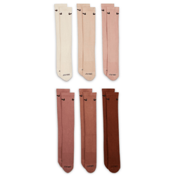 Six pairs of knee-high socks in various shades of beige, pink, and brown, each featuring a small black swoosh logo and \“DRI-FIT\“ text at the toes.