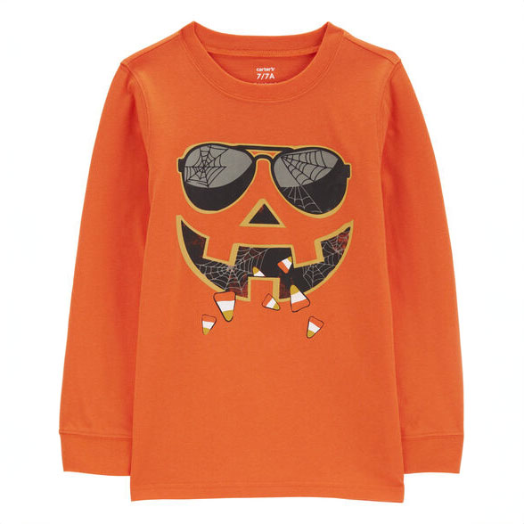 An orange long-sleeved tee featuring a black graphic of a pumpkin wearing sunglasses, designed with a glow-in-the-dark effect.