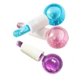 Three colorful facial ice globes with textured white handles in blue, pink, and purple, used for skin soothing and de-puffing.