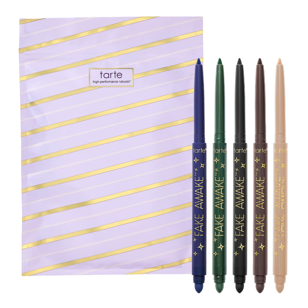 Five Tarte eyeliner pencils in various colors (blue, green, black, brown, and beige) are displayed alongside a purple and gold striped pouch.