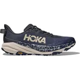 Hoka trail running shoe in dark blue with a beige midsole, featuring a Vibram outsole for enhanced traction.