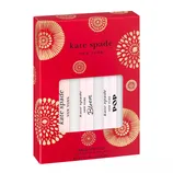 Kate Spade New York Travel Spray Set features three eau de parfums: Kate Spade, Bloom, and Pop. Each bottle contains 7.5 ml (0.25 fl oz). The packaging is red with gold floral designs.