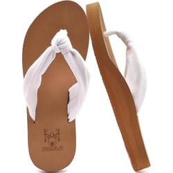 White, thong-style sandals with a brown sole, featuring yoga foam for arch support. The strap is padded for comfort, and the footbed has a textured design with a small deer logo.