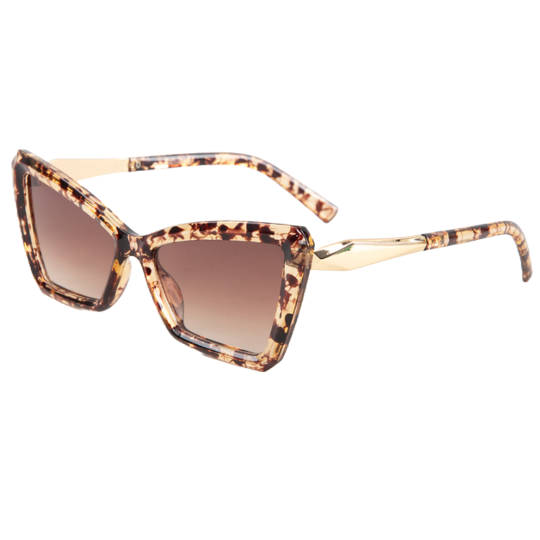 Cat-eye tortoiseshell sunglasses with gradient brown lenses and gold accents on the arms.