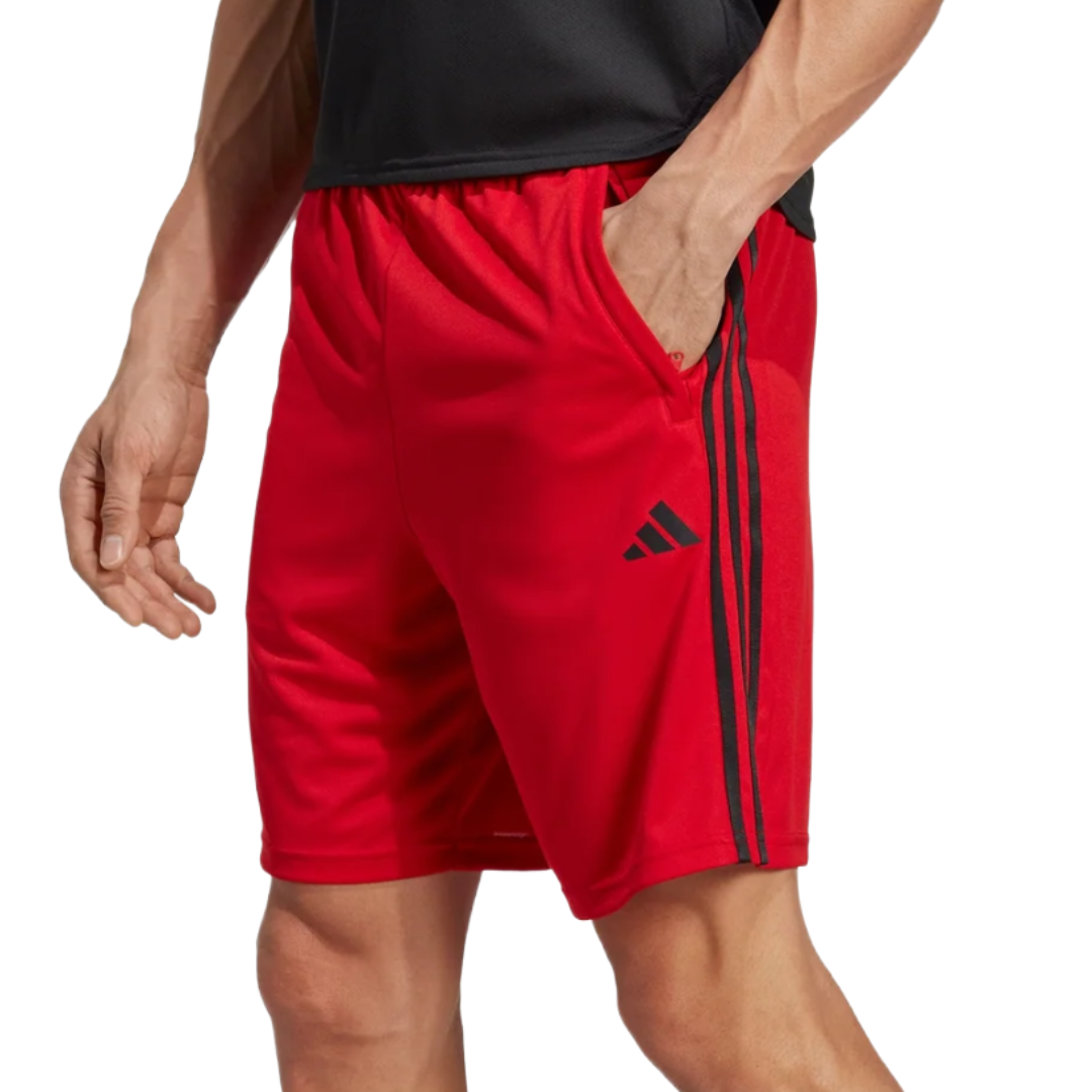 Red athletic shorts with black stripes and the Adidas logo.
