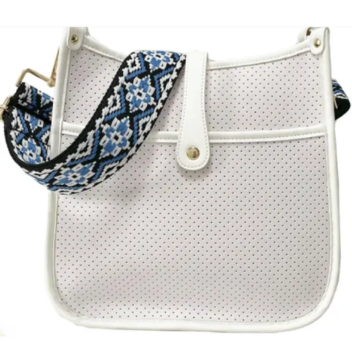 White perforated bag with a blue and black patterned strap.