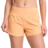 Peach-colored athletic shorts with a high waistband, suitable for fitness activities.