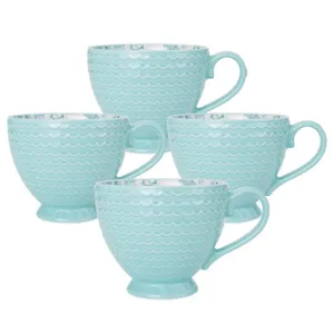 Set of four light blue ceramic mugs with a wavy pattern design and curved handles.