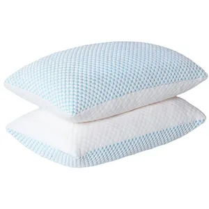 Two stacked pillows with a textured white and light blue checkered pattern.