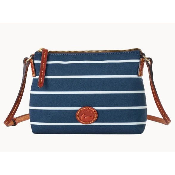 A small blue crossbody bag with white horizontal stripes, featuring brown leather accents and a zipper closure.