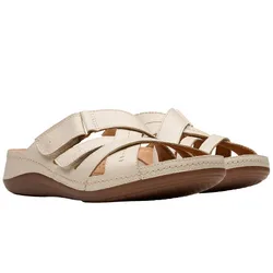 Beige open-toe sandals with wide straps and a Velcro closure, featuring a brown sole designed for comfort and casual wear.