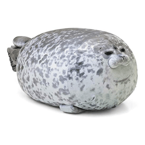 A round, grey seal plush toy with a spotted pattern, resembling a realistic seal.