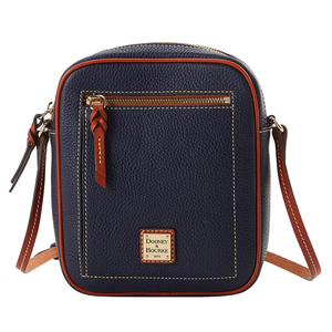 The Dooney Pebble Leather Crossbody is a compact, navy blue bag with contrast stitching and brown leather accents. It features a front zip pocket, adjustable strap, and a Dooney & Bourke logo patch on the front.