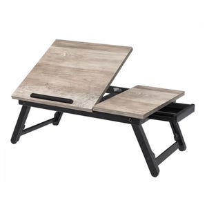 Foldable lap desk with adjustable tilted section, small fixed section, and a side drawer, featuring a wood finish and black legs.