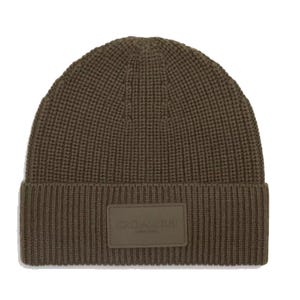 A brown Coach knit beanie featuring a ribbed design with a fold-over cuff and a prominent rubber patch displaying the Coach logo.