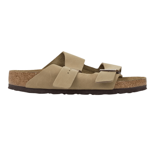 A classic beige sandal with two adjustable straps and a cork footbed, likely a Birkenstock style.