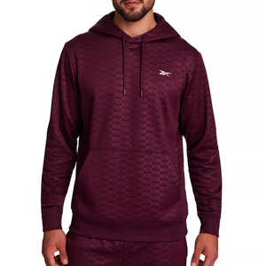 Maroon hoodie with a subtle pattern, featuring a small logo on the chest, drawstrings, and a front pocket.