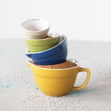 A stack of colorful measuring cups.