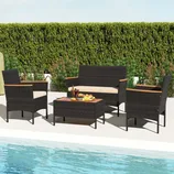 4-piece wicker patio set with two armchairs, a loveseat, and a rectangular coffee table. Features dark wicker with light-colored cushions and wooden accents on the armrests, set beside a pool with a background of tall green hedges.