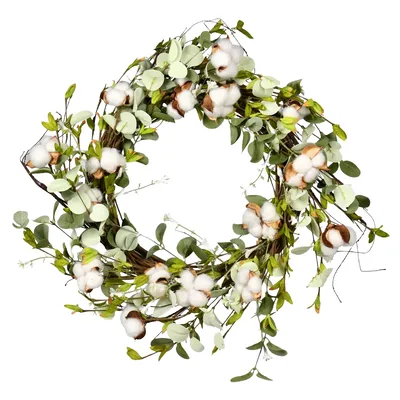 A decorative wreath featuring green leaves, twig branches, and cotton bolls.