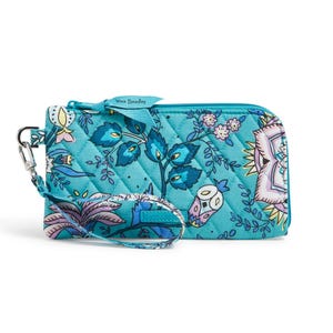 Turquoise quilted wristlet with floral pattern, detachable strap, and zip closure.