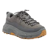 A gray hiking shoe with robust tread, featuring thick laces and a durable, cushioned sole with an orange grip pattern for enhanced traction.