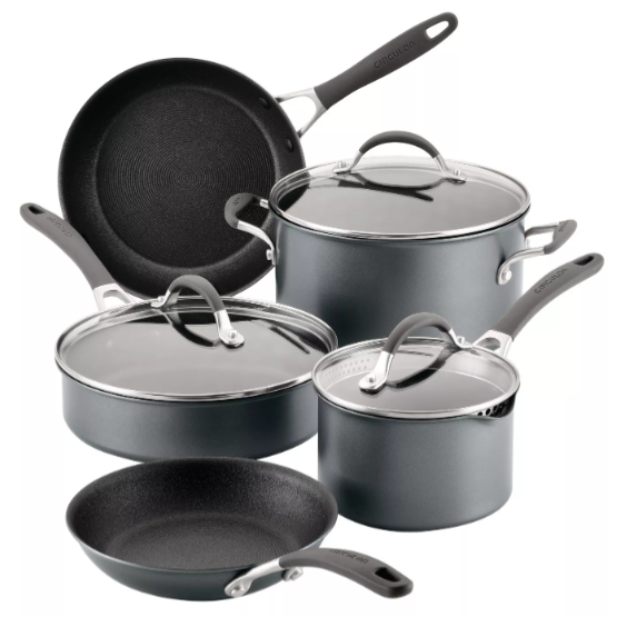 A nonstick cookware set featuring two frying pans, a saucepan with lid, a sauté pan with lid, and a stockpot with lid.