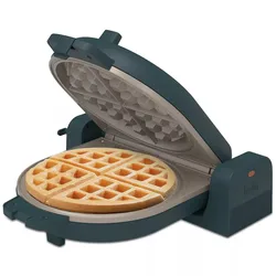 A waffle maker with a round, sectioned waffle inside, featuring a non-stick cooking surface and a dark blue exterior.
